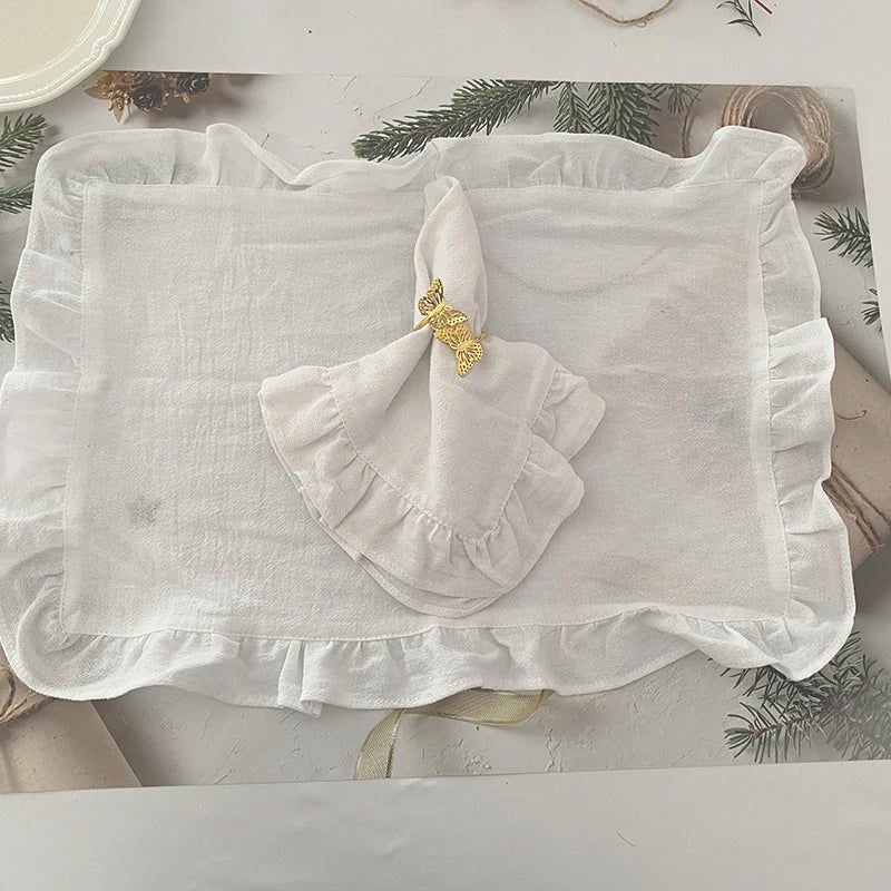 Sets de table serviettes blanches volants